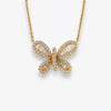 Baguette diamond butterfly on yellow gold. 