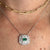 White Gold Emerald and Diamond Pendant Necklace