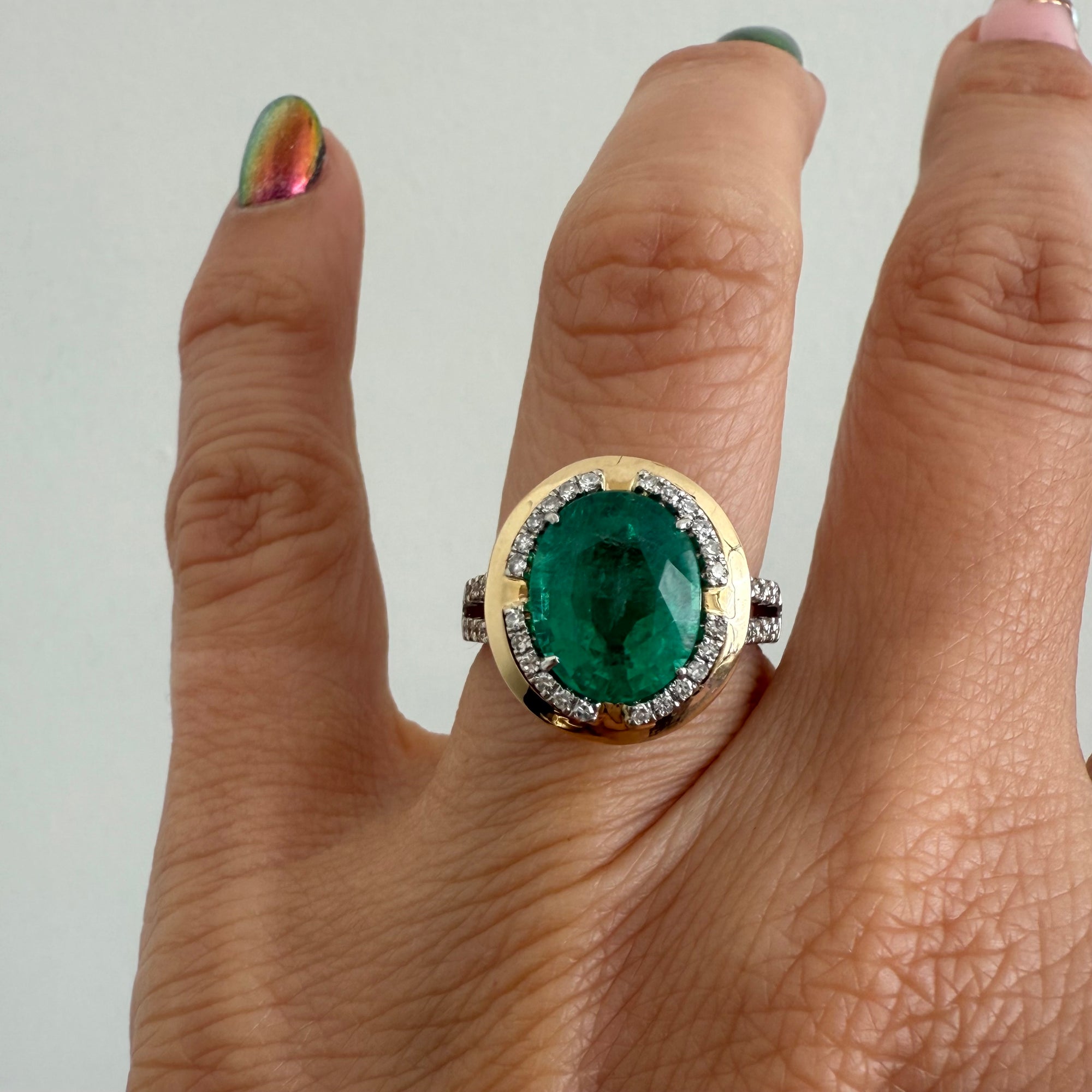 Oval Emerald and Diamond Ring