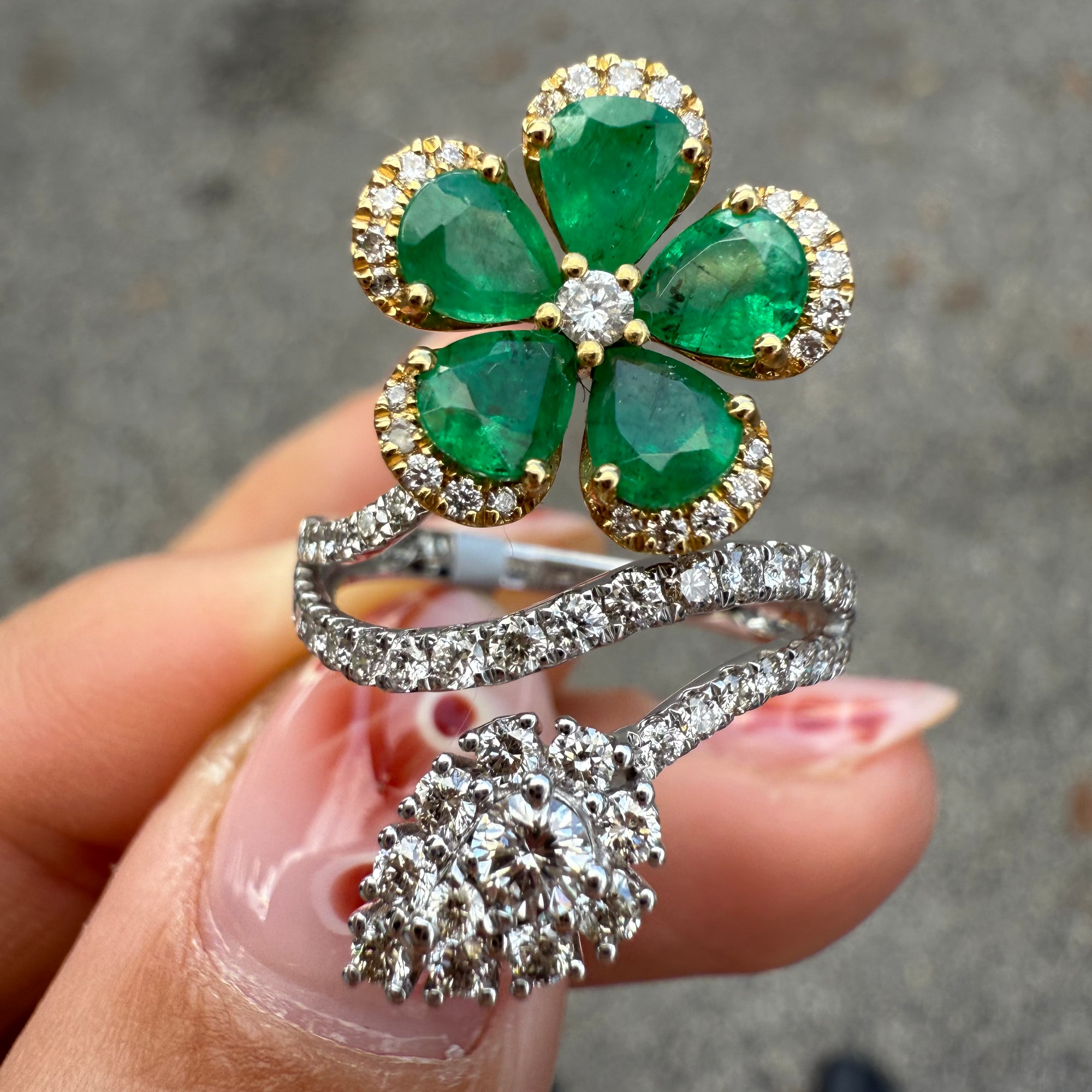 Emerald flower and diamond statement ring in 18K gold, handcrafted by Santayana Jewelers Miami