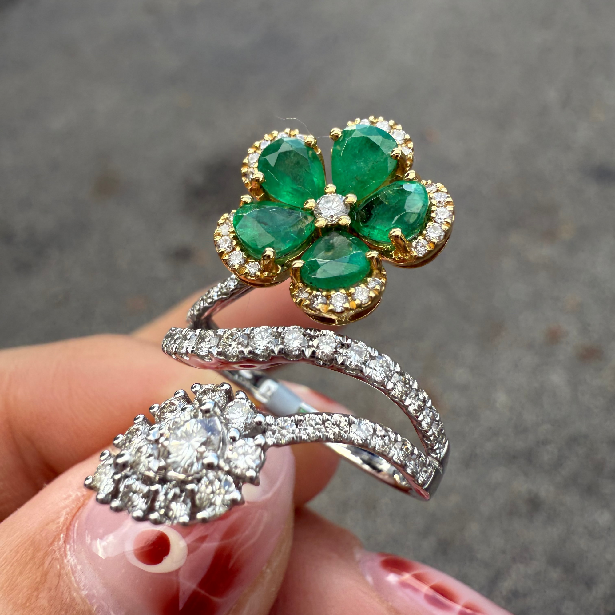 Emerald flower and diamond statement ring in 18K gold, handcrafted by Santayana Jewelers Miami